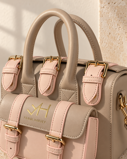 Close-up of Frank Harvey Safety Handbag handles, buckles and stitching